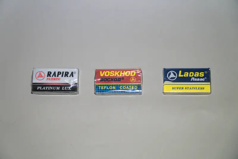 A box, each, of Rapira Platinum LUX, Voskhod, and Ladas razor blades