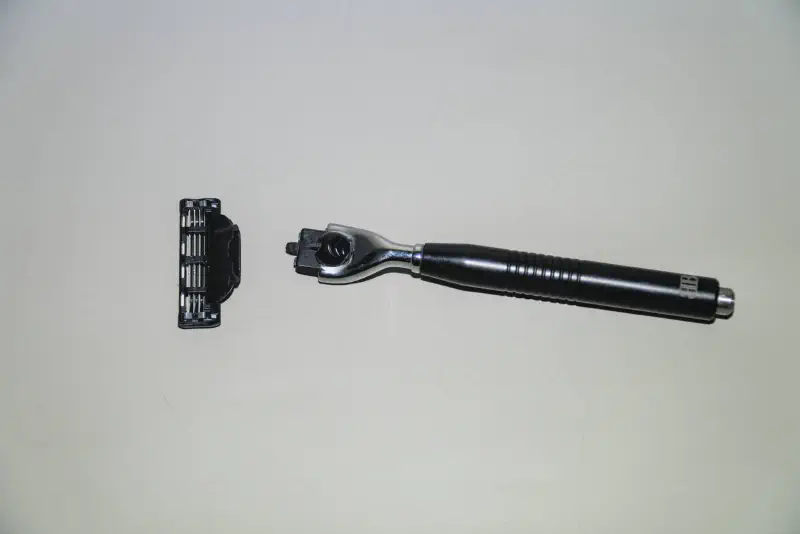 A custom Mach3 blade handle with blade detached